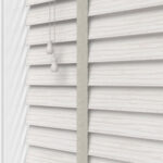 whitewash wooden blinds with close up of slats, tape and cords