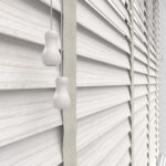 close up detail of whitewash wooden blinds